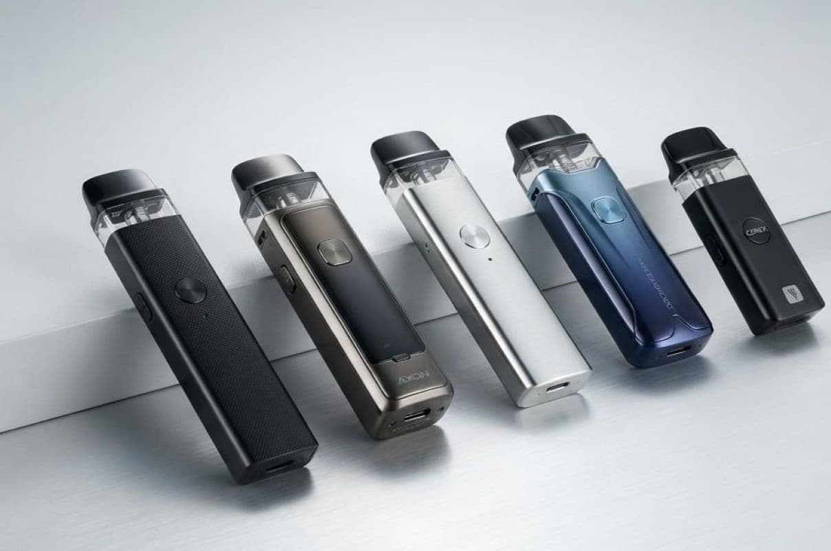 A premium lineup of Vaporesso XROS series vape pods showing their sleek aluminum alloy builds, visible clear pods, and precise airflow sliders.